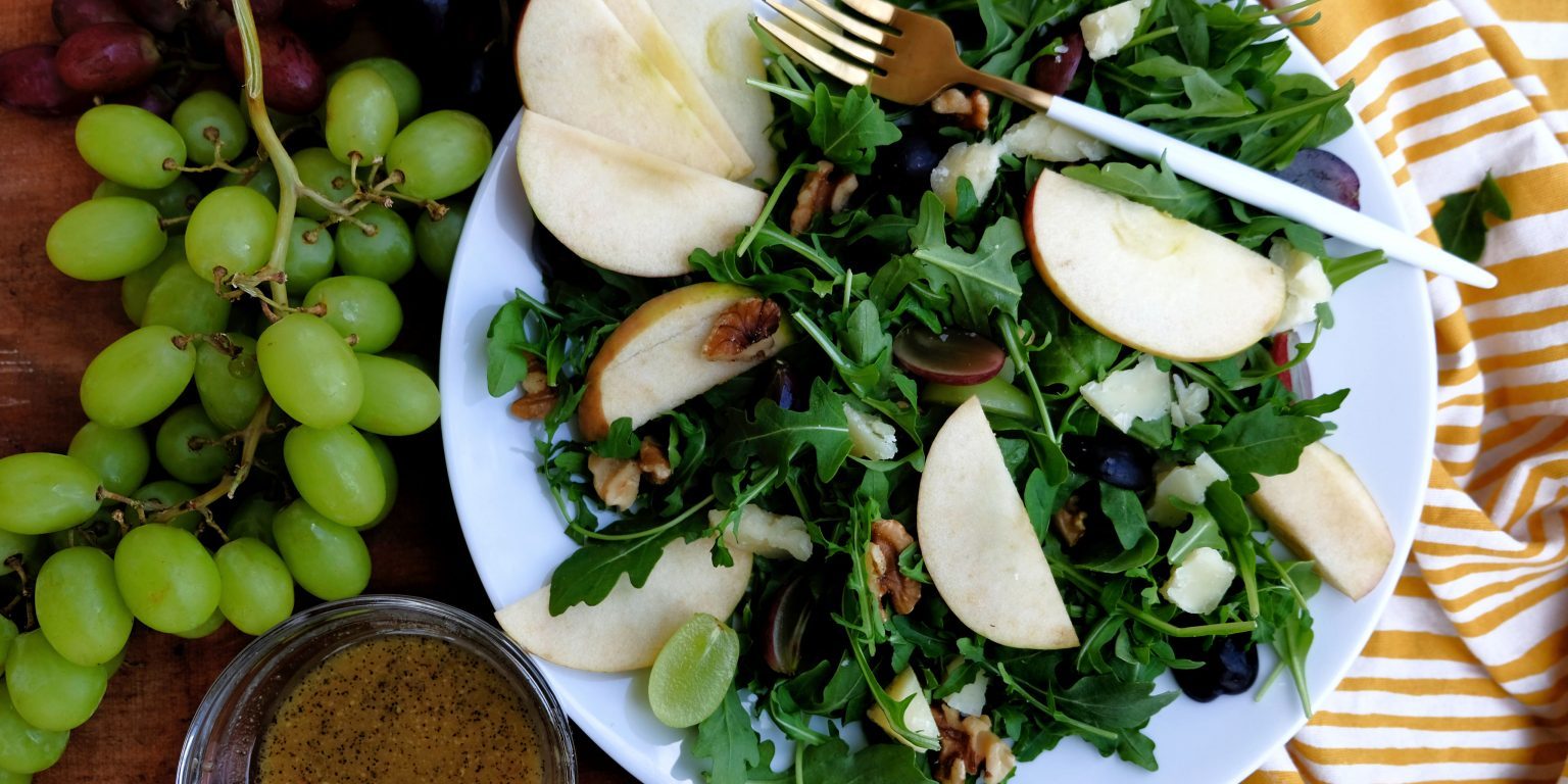 Fall Harvest Salad arugula salad, arugula salad with grapes, arugula salad with apples,, arugula salad with manchego cheese, arugula salad with walnuts, easy arugula salad recipes, fall inspired salad recipes, easy fall inspired salads, fall inspired salads with apples, apple cider vinaigrette, homemade apple cider vinaigrette, apple and maple vinaigrette recipe, quick salad recipes for autumn, autumn inspired salads, free online salad recipes,