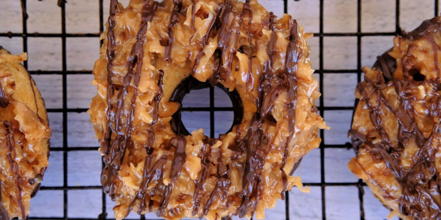 Baked Samoa Doughnut baked doughnut, baked doughnut recipe, easy baked doughnut recipe, free online doughnut recipes, baked doughnut ideas, breakfast recipes, easy breakfast recipes, homemade breakfast recipe, breakfast baking recipes, easy baking recipes, quick baking recipes, Samoa doughnuts, doughnut recipe with Samoa topping, Samoa recipe, how to make Samoa Cookie, Samoa girl scout cookie recipe,