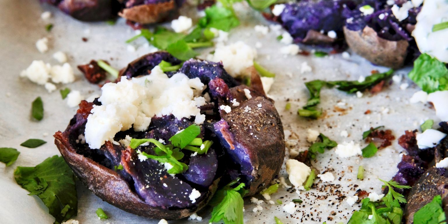 smashed potatoes, easy smashed potato recipe, side dish recipes, potato side dish recipe, easy potato recipes, easy potato side dish recipe, purple potato recipes, cilantro crema, cilantro sour cream, side dish recipes