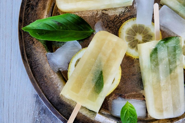boozy popsicles recipes, boozy pops, boozy summer popsicles, summer popsicles, adult popsicles, basil lemonade, how to make basil lemonade, how to make lemonade popsicles, dessert recipes, easy dessert recipes, frozen cocktails, frozen cocktail recipes, easy frozen cocktails, popsicles recipes
