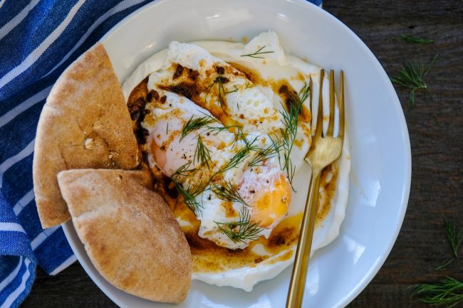 how to make turkish eggs, easy turkish eggs recipe, breakfast turkish eggs recipe, egg recipes for breakfast, poached eggs, how to poach eggs, chili oil recipe, how to make chili oil, middle eastern breakfast recipe, savory breakfast recipe
