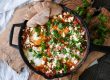 how to make Shakshuka, easy Shakshuka recipe, what is Shakshuka, Shakshuka with eggplant, eggs in purgatory, eggs in spicy tomato sauce, savory egg recipe, eggs in a spicy tomato sauce, baked eggs in tomatoes,